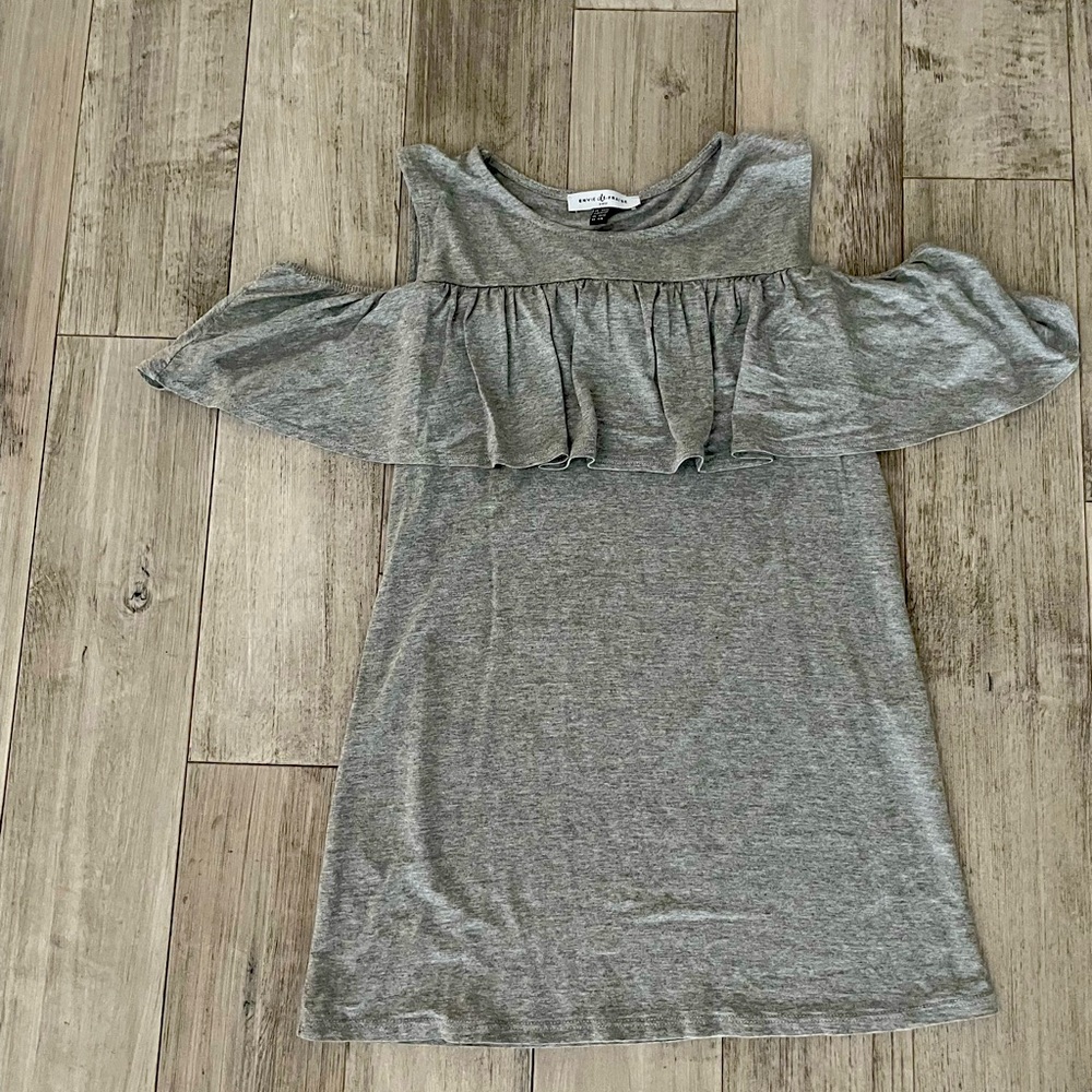 Grey top.